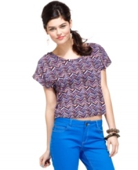 Zigzag mania reigns on this printed top from Material Girl! Flaunting a network of back cutouts, this piece looks extra cool with a pair of jeans that are as bold as you! Zigzag mania reigns on this printed top from Material Girl! Flaunting a network of back cutouts, this piece looks extra cool with a pair of jeans that are as bold as you!