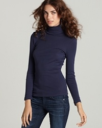 Super comfortable and a perfect addition to any wardrobe, this chic turtleneck is rendered in a luxuriously soft blend of Supima cotton and modal. Wear with leggings or skinny jeans for a streamlined silhouette. Super comfortable and a perfect addition to any wardrobe, this chic turtleneck is rendered in a luxuriously soft blend of Supima cotton and modal. Wear with leggings or skinny jeans for a streamlined silhouette.