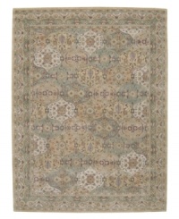 Imported from India, this magnificent rug presents a courtly style fit for today's most fashionable homes. Varying shades of green and beige are patterned in distinctive traditional design. Hand-tufted from ultra-soft 100% wool pile. Imported from India, this magnificent rug presents a courtly style fit for today's most fashionable homes. Varying shades of green and beige are patterned in distinctive traditional design. Hand-tufted from ultra-soft 100% wool pile.