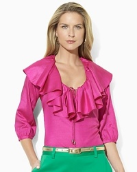 Cascades of ruffles and a sumptuous silk construction make the Melia blouse a unique addition to any stylish woman's wardrobe. Cascades of ruffles and a sumptuous silk construction make the Melia blouse a unique addition to any stylish woman's wardrobe.