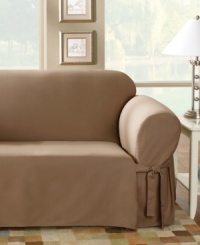 The simple sophistication of modern design is captured in these durable, pure cotton slipcovers. Made from dense cotton duck, they'll stand up to what life dishes out, and they'll get softer and more inviting wash after wash. Coordinating accent pillows add a tailored look. Straight skirt. Fits loveseats measuring 40-73 from outer arm to outer arm. Machine washable. Dyed for deep rich tones, colors should be line dried; Natural is tumble dry. The simple sophistication of modern design is captured in these durable, pure cotton slipcovers. Made from dense cotton duck, they'll stand up to what life dishes out, and they'll get softer and more inviting wash after wash. Coordinating accent pillows add a tailored look. Straight skirt. Fits loveseats measuring 40-73 from outer arm to outer arm. Machine washable. Dyed for deep rich tones, colors should be line dried; Natural is tumble dry.
