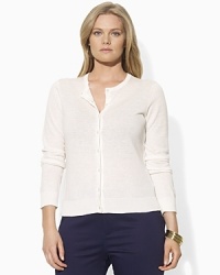 A timeless essential for lightweight layering, the long-sleeved Dallya cardigan is crafted in a luxe blend of linen and cotton with pearlized monogram-embossed buttons for a refined finish. A timeless essential for lightweight layering, the long-sleeved Dallya cardigan is crafted in a luxe blend of linen and cotton with pearlized monogram-embossed buttons for a refined finish.