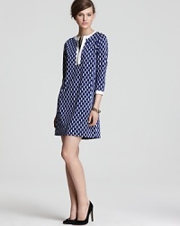 Modern meets vintage in this DIANE von FURSTENBERG dress, boasting a retro-inspired print and silhouette. Modern meets vintage in this DIANE von FURSTENBERG dress, boasting a retro-inspired print and silhouette.