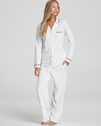 All-over polka dots lend a retro feel to this lace- and ribbon-accented pajama set from Eileen West. All-over polka dots lend a retro feel to this lace- and ribbon-accented pajama set from Eileen West.