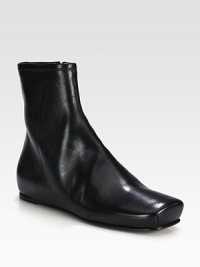 A simple and street-cool flat design, rendered in buttery leather and topped off with a square toe. Leather upperLeather lining and soleSquare toeSide zipPadded insoleImported A simple and street-cool flat design, rendered in buttery leather and topped off with a square toe. Leather upperLeather lining and soleSquare toeSide zipPadded insoleImported