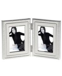 Add new elegance to beautiful memories with Vera Wang's With Love Blanc folding picture frame. Geometric detail lends metallic shimmer to creamy white enamel in a home accent that invokes modern and deco design. Add new elegance to beautiful memories with Vera Wang's With Love Blanc folding picture frame. Geometric detail lends metallic shimmer to creamy white enamel in a home accent that invokes modern and deco design.