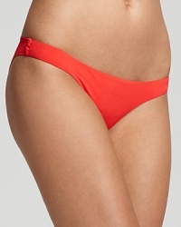 Whether at the pool or on the coast of Capri, Zimmerman's low bikini looks lush in a tropical hue.