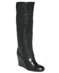 Polish your look with the sophisticated Mauraa tall wedge boots by STEVEN by Steve Madden. Golden studs stretch up the back, providing the perfect hint of shine. Polish your look with the sophisticated Mauraa tall wedge boots by STEVEN by Steve Madden. Golden studs stretch up the back, providing the perfect hint of shine.