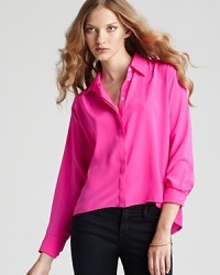 Pretty in pink, this airy Amanda Uprichard shirt of rich silk takes on the high/low trend and masters it. Pretty in pink, this airy Amanda Uprichard shirt of rich silk takes on the high/low trend and masters it.