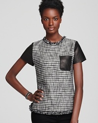 Luxe textures combine in this chic Rebecca Taylor tweed top with touches of leather for an ultra-modern aesthetic.