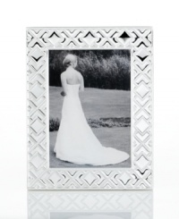 Mirroring the intricate folds of origami, this gleaming silver-plated picture frame makes art of any memory. From Martha Stewart Collection. Mirroring the intricate folds of origami, this gleaming silver-plated picture frame makes art of any memory. From Martha Stewart Collection.