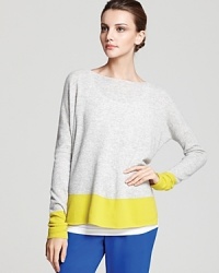 Cashmere gets contemporary with the addition of color blocking on this Vince sweater. All in one, it's both comfortable and cool. Cashmere gets contemporary with the addition of color blocking on this Vince sweater. All in one, it's both comfortable and cool.