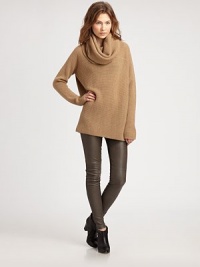 Slightly oversized and styled with a cozy cowlneck, all in a lush blend of wool, alpaca and camel.CowlneckDropped shouldersLong sleevesPullover style50% wool/20% nylon/20% alpaca/10% camelDry cleanImported of Italian fabricModel shown is 5'11 (180cm) wearing US size Small. Slightly oversized and styled with a cozy cowlneck, all in a lush blend of wool, alpaca and camel.CowlneckDropped shouldersLong sleevesPullover style50% wool/20% nylon/20% alpaca/10% camelDry cleanImported of Italian fabricModel shown is 5'11 (180cm) wearing US size Small.