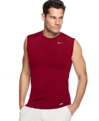 In motion. Stay going strong with this fitted sleeveless t-shirt from Nike featuring Dri-Fit technology. In motion. Stay going strong with this fitted sleeveless t-shirt from Nike featuring Dri-Fit technology.