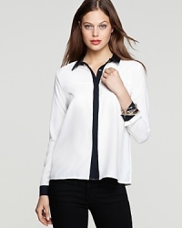 A supple leather collar lends edgy luxury to this PJK Patterson J. Kincaid blouse, a downtown-cool take on an office staple. A supple leather collar lends edgy luxury to this PJK Patterson J. Kincaid blouse, a downtown-cool take on an office staple.