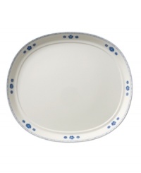 Vintage charm meets modern durability in the Farmhouse Touch serving plate, featuring cornflower-blue bands and blooms in premium porcelain from Villeroy & Boch. Vintage charm meets modern durability in the Farmhouse Touch serving plate, featuring cornflower-blue bands and blooms in premium porcelain from Villeroy & Boch.