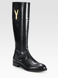 Superior craftsmanship defines this fine leather design with signature hardware. Stacked heel, 1 (25mm)Shaft, 15Leg circumference, 14½Leather upper with goldtone hardwareSide zipLeather liningRubber solePadded insoleMade in Italy Superior craftsmanship defines this fine leather design with signature hardware. Stacked heel, 1 (25mm)Shaft, 15Leg circumference, 14½Leather upper with goldtone hardwareSide zipLeather liningRubber solePadded insoleMade in Italy