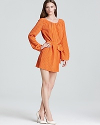 A '60s-inspired silhouette brings retro charm to this vibrant Shoshanna dress, finished with dramatic bishop sleeves and a waist-defining tie. A '60s-inspired silhouette brings retro charm to this vibrant Shoshanna dress, finished with dramatic bishop sleeves and a waist-defining tie.