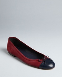 Pure elegance, these Delman ballet flats marry classic styling with stylish cap toe details. Pure elegance, these Delman ballet flats marry classic styling with stylish cap toe details.