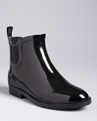 Take a shortcut to slick style on your next rainy day in these high-gloss, Chelsea-style rain boots by Ted Baker. Take a shortcut to slick style on your next rainy day in these high-gloss, Chelsea-style rain boots by Ted Baker.