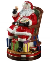 Santa at his merriest. In a classic depiction of St. Nick, Christopher Radko's heirloom Christmas figurine is rich with detail, from colorfully wrapped presents to a plate of fresh cookies. Santa at his merriest. In a classic depiction of St. Nick, Christopher Radko's heirloom Christmas figurine is rich with detail, from colorfully wrapped presents to a plate of fresh cookies.