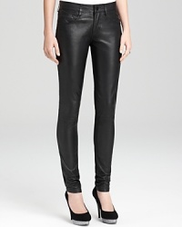 These skinny black leather French Connection pants evoke the essence of rocker-chic for stylish escapades downtown in a classic five-pocket silhouette. These skinny black leather French Connection pants evoke the essence of rocker-chic for stylish escapades downtown in a classic five-pocket silhouette.
