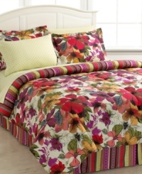 Layer your bed in fresh, blooming florals with the Rosa bedding ensemble, featuring a vibrant palette that makes a bold statement in any room. Comforter reverses to an eclectic stripe pattern so you get multiple looks with one set. Comes complete with coordinating shams, bedskirt and sheet set. Layer your bed in fresh, blooming florals with the Rosa bedding ensemble, featuring a vibrant palette that makes a bold statement in any room. Comforter reverses to an eclectic stripe pattern so you get multiple looks with one set. Comes complete with coordinating shams, bedskirt and sheet set.