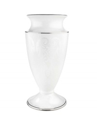 A beautiful porcelain vase with a light detailed design and platinum trim, perfect for all your floral arrangements and striking enough to stand regally all on its own. A beautiful porcelain vase with a light detailed design and platinum trim, perfect for all your floral arrangements and striking enough to stand regally all on its own.