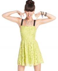 Rock out, girl style, in this a-line dress from Material Girl -- where dark straps pop against a bright body of lace! Rock out, girl style, in this a-line dress from Material Girl -- where dark straps pop against a bright body of lace!