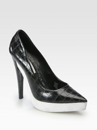A bio-degradable rubber heel lifts this modern point toe pump, expertly crafted in Spain of textured faux crocodile. Self-covered heel, 5¾ (145mm)Bio-degradable rubber platform, 1¼ (30mm)Compares to a 4½ heel (115mm)Faux crocodile upperPoint toeFaux leather lining and solePadded insoleMade in Spain A bio-degradable rubber heel lifts this modern point toe pump, expertly crafted in Spain of textured faux crocodile. Self-covered heel, 5¾ (145mm)Bio-degradable rubber platform, 1¼ (30mm)Compares to a 4½ heel (115mm)Faux crocodile upperPoint toeFaux leather lining and solePadded insoleMade in Spain