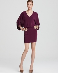 Jeweled cuffs lend a gilded look to a blousy-fit dress from Laundry by Shelli Segal, rendered in a trend-right jewel tone hue. Jeweled cuffs lend a gilded look to a blousy-fit dress from Laundry by Shelli Segal, rendered in a trend-right jewel tone hue.