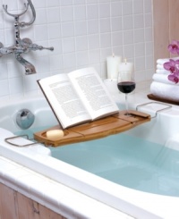 Relaxation done right! Read, recline and even sip your favorite drink all while soaking in your tub with the Aquala Bathtub Caddy. Featuring convenient compartments that keep your soap, novel and wine glass easily within reach. Metal handles lay on to the edge of your tub for stability. Relaxation done right! Read, recline and even sip your favorite drink all while soaking in your tub with the Aquala Bathtub Caddy. Featuring convenient compartments that keep your soap, novel and wine glass easily within reach. Metal handles lay on to the edge of your tub for stability.