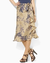 Hand-painted with a large floral pattern, the flowing silk Ludine skirt is crafted in a ruffled sarong silhouette. Hand-painted with a large floral pattern, the flowing silk Ludine skirt is crafted in a ruffled sarong silhouette.