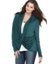 Add a cool twist to your look with Soprano's long sleeve plus size top, featuring a draped front and inset. Add a cool twist to your look with Soprano's long sleeve plus size top, featuring a draped front and inset.