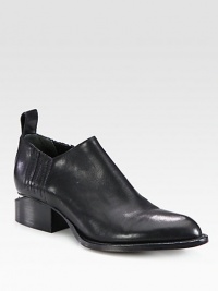 An oxford-inspired leather silhouette with elastic side gores and modern cut-out stacked heel. Stacked heel, 1¼ (30mm)Leather upper with elastic goresLeather pull-tabLeather lining and solePadded insoleImported An oxford-inspired leather silhouette with elastic side gores and modern cut-out stacked heel. Stacked heel, 1¼ (30mm)Leather upper with elastic goresLeather pull-tabLeather lining and solePadded insoleImported