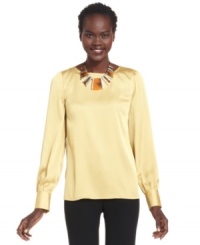 The bright citron hue of Nine West's satin blouse effortlessly perks up your office look. Pair it with coordinating separates or try it with your favorite suits. The bright citron hue of Nine West's satin blouse effortlessly perks up your office look. Pair it with coordinating separates or try it with your favorite suits.