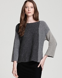 Crisp color blocking lends sculptural dimension to a boxy Eileen Fisher Petites top for a bold style statement. Crisp color blocking lends sculptural dimension to a boxy Eileen Fisher Petites top for a bold style statement.