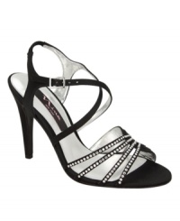 Get ready to shine during your night on the town. The crisscrossing straps and rhinestone detail add intrigue to the Chara sandals by Nina. Get ready to shine during your night on the town. The crisscrossing straps and rhinestone detail add intrigue to the Chara sandals by Nina.