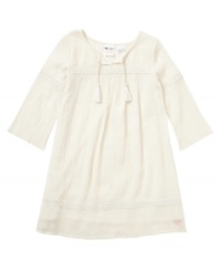 Breezy style to take to the surf, this crochet-trim dress from Roxy gives her a lovely look. Breezy style to take to the surf, this crochet-trim dress from Roxy gives her a lovely look.