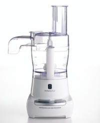 Wolfgang Puck wants to change the food prep process. His innovative food processor features a unique, spouted continuous flow lid that lets you slice, shred, chop, mix, knead, puree or emulsify directly into a separate container. One-year warranty. Model WPFPR035. Wolfgang Puck wants to change the food prep process. His innovative food processor features a unique, spouted continuous flow lid that lets you slice, shred, chop, mix, knead, puree or emulsify directly into a separate container. One-year warranty. Model WPFPR035.