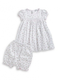 THE LOOKAllover charming rose printCap-sleeve dress with smocked front and contrast picot trimEmpire waistBack snapsRose print pants with elastic waist and ruffle cuffsTHE MATERIALPima cottonCARE & ORIGINMachine washImported THE LOOKAllover charming rose printCap-sleeve dress with smocked front and contrast picot trimEmpire waistBack snapsRose print pants with elastic waist and ruffle cuffsTHE MATERIALPima cottonCARE & ORIGINMachine washImported