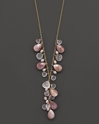 Clusters of faceted teardrops in mother-of-pearl and rose quartz add romance to a 14K yellow gold Y chain. Clusters of faceted teardrops in mother-of-pearl and rose quartz add romance to a 14K yellow gold Y chain.