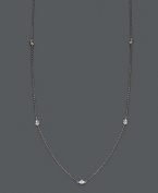 Add sparkle and shine by the inch. Trio by Effy Collection's stunning necklace features seven stations of round cut, bezel-set diamonds (5/8 ct. t.w.) strung from a delicate, 14k white gold chain. Approximate length: 24 inches.