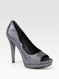 Shine on with this glittery peep toe design, resting on a platform and sky-high heel. Self-covered heel, 4¾ (120mm)Covered platform, 1 (25mm)Compares to a 3¾ heel (95mm)Glitter-coated fabric upperPeep toeLeather lining and solePadded insoleImportedOUR FIT MODEL RECOMMENDS ordering true size. Shine on with this glittery peep toe design, resting on a platform and sky-high heel. Self-covered heel, 4¾ (120mm)Covered platform, 1 (25mm)Compares to a 3¾ heel (95mm)Glitter-coated fabric upperPeep toeLeather lining and solePadded insoleImportedOUR FIT MODEL RECOMMENDS ordering true size.