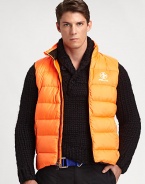 Crafted from durable polyester ripstop, this sporty down vest provides superior cold-weather protection without the bulk.Two-way zip frontSide zip pocketsAbout 22 from shoulder to hemPolyesterFill: 80% down/20% other feathersMachine washImported