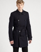 A signature double-breasted trench is structured in a sleek, rain-resistant cotton-wool blend with military-inspired epaulettes, belt-and-button detail behind the collar and a removable warmer for added warmth and versatility.Button-frontShoulder epaulettesHip slash pocketsBelted waistRear ventAbout 35 from shoulder to hem54% cotton/23% virgin wool/23% acrylicDry cleanImportedThis style runs true to size. 