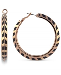 Print's charming. A black chevron pattern adorns these hoop earrings from Vince Camuto. The pair is crafted from rose gold-tone mixed metal and features a click-top closure. Approximate drop: 1-1/2 inches. Print's charming. A black chevron pattern adorns these hoop earrings from Vince Camuto. The pair is crafted from rose gold-tone mixed metal and features a click-top closure. Approximate drop: 1-1/2 inches.