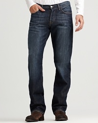 The 221 channels the look and feel of a standby jean, crafted in a deep blue denim and rendered in a slim fit for a trimmer silhouette. The 221 channels the look and feel of a standby jean, crafted in a deep blue denim and rendered in a slim fit for a trimmer silhouette.