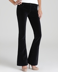 Give your skinny pants the night off and take these velvet-touch James jeans out on the town--a flattering flared trumpet leg lends an elegant drape to these black beauties. Give your skinny pants the night off and take these velvet-touch James jeans out on the town--a flattering flared trumpet leg lends an elegant drape to these black beauties.