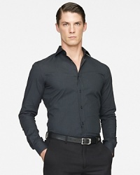 Finely tailored with a trim fit and modern proportions, a handsome sport shirt is crafted in Italy from sleek stretch poplin. Finely tailored with a trim fit and modern proportions, a handsome sport shirt is crafted in Italy from sleek stretch poplin.